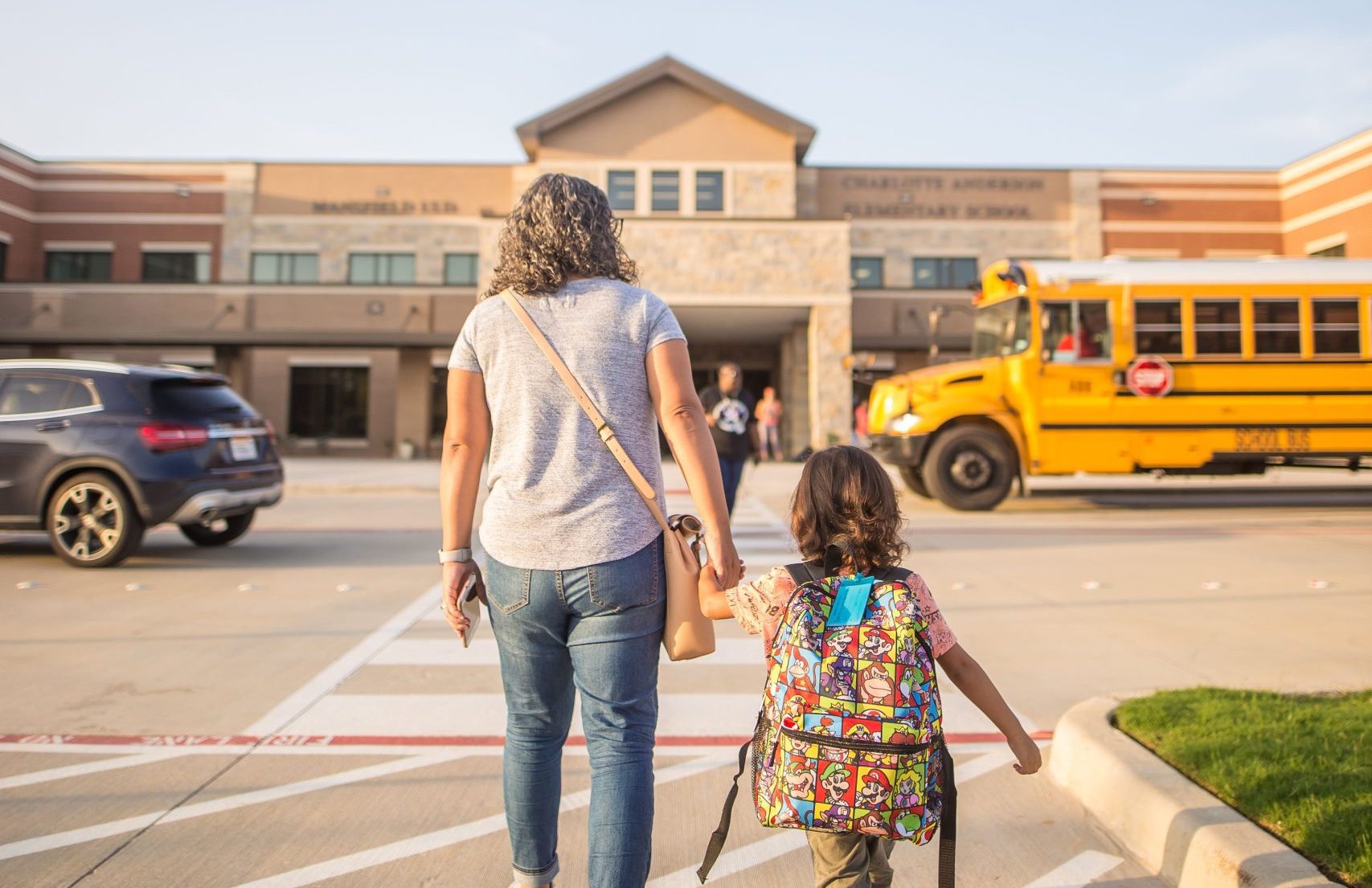 8142026 Blog Photo Child heading back to school with a parent as part of their ABA therapy back-to-school routine